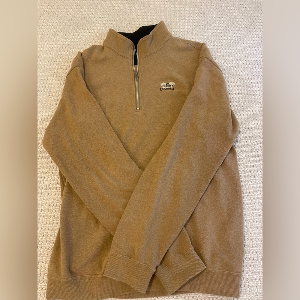 Straight down tan pull over with logo
